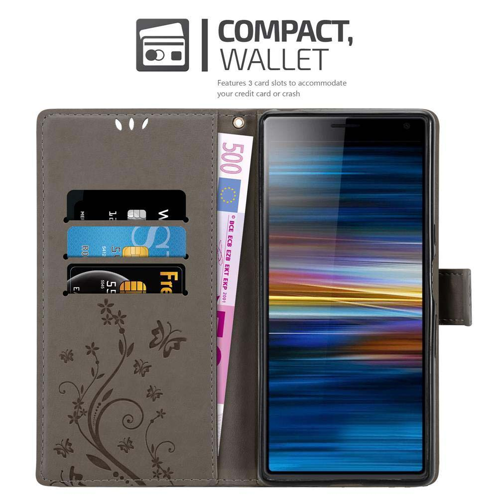Custodia del telefono aperta con un telefono all'interno. Carte e denaro visibili.