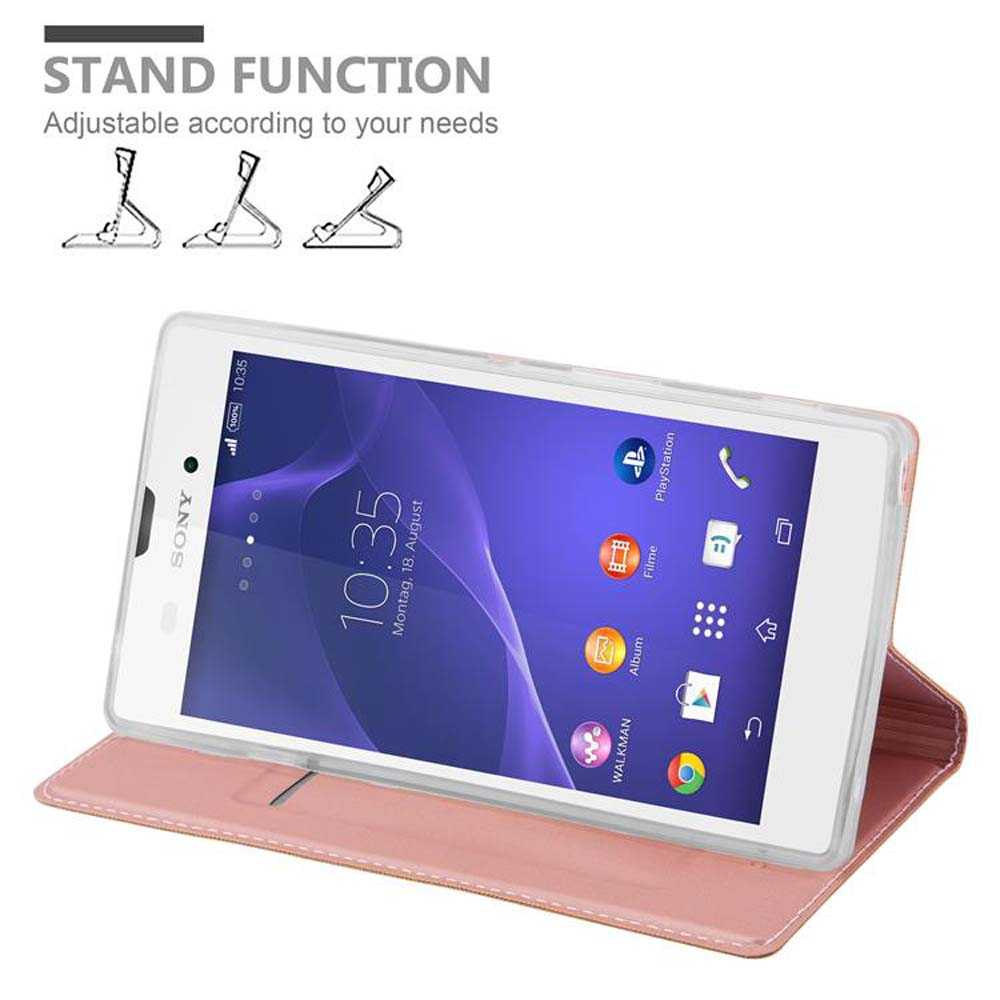 Teléfono en funda rosa, en soporte, sobre superficie blanca.