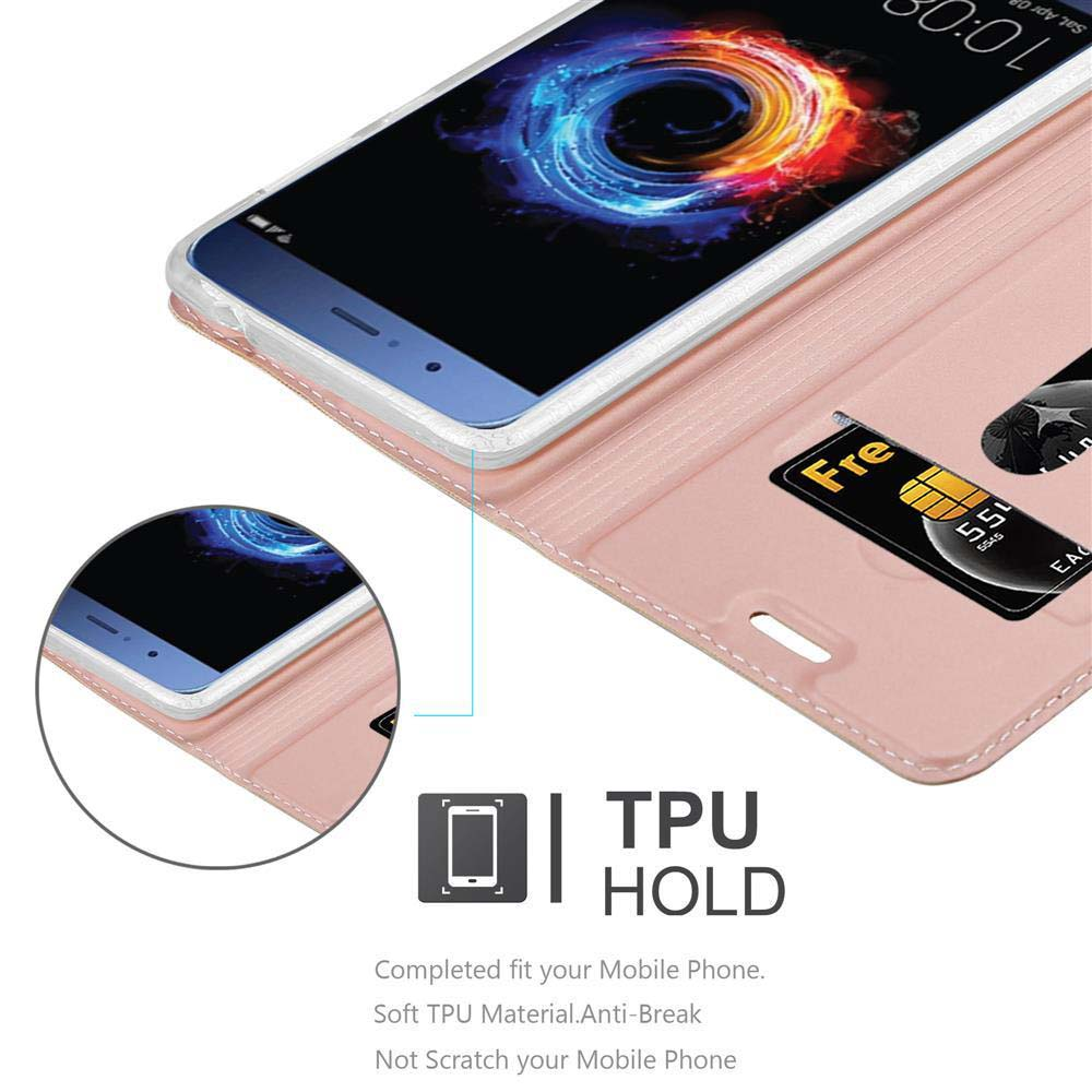 Un telefono in una custodia rosa mostra uno schermo con un'immagine colorata e una carta.