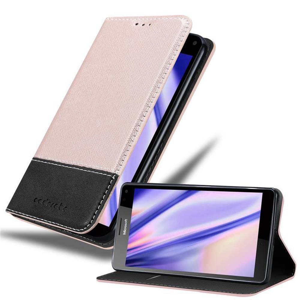 Teléfono en funda rosa y negra con tapa abierta. Otro teléfono está abierto. La funda está abierta.
