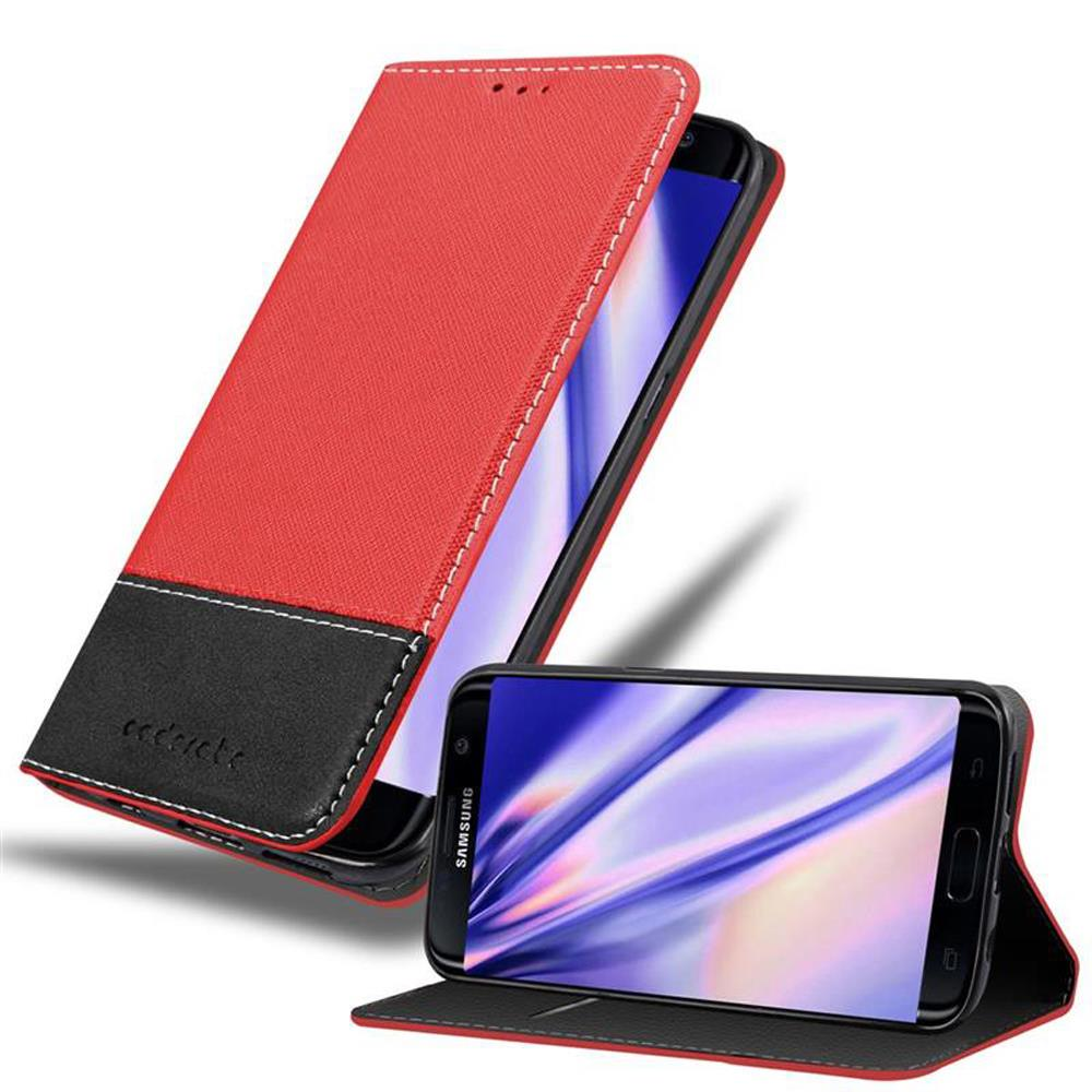 Una funda con tapa para smartphone roja y negra. El teléfono está abierto. La pantalla muestra una imagen.