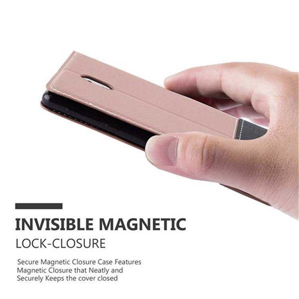 Eine Hand, die eine rosa Handyhülle mit den Worten 'Invisible Magnetic' hält.