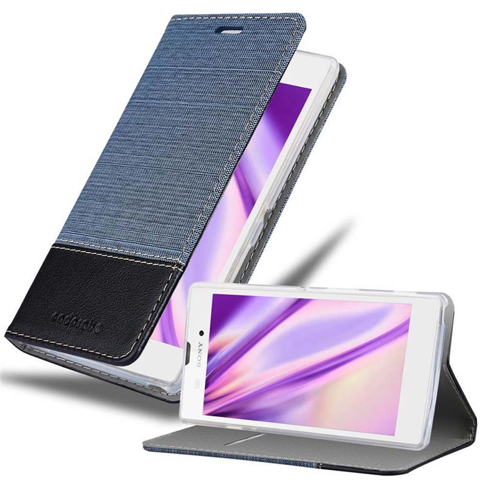 Una funda de teléfono con tela azul y una cubierta de cuero negro, con un teléfono dentro. La cubierta está abierta.