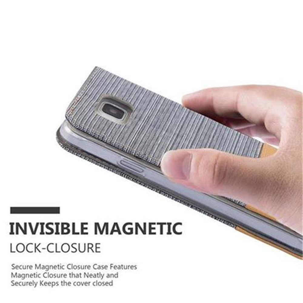 Eine Hand hält eine Handyhülle offen und zeigt ein Telefon darin, mit dem Text 'INVISIBLE MAGNETIC'.