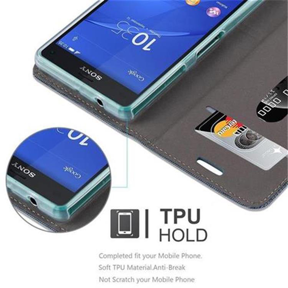 Teléfono en una funda abierta. La pantalla muestra detalles. Una tarjeta de crédito está en una ranura.