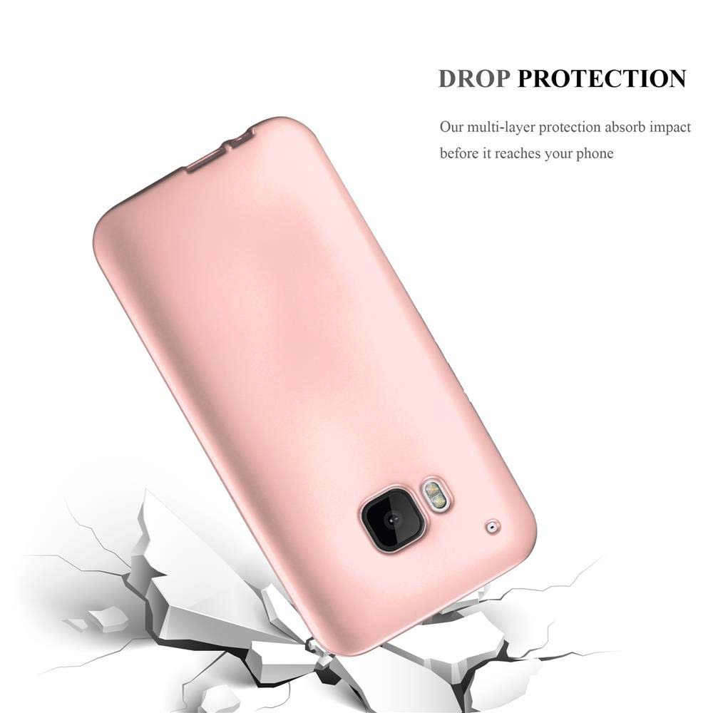 Una custodia per telefono rosa che cade su cemento rotto. La custodia è di un colore solido e angolata.