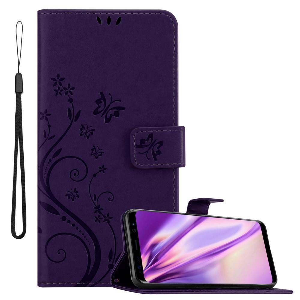 Custodia per telefono viola con design a farfalla, aperta per visualizzare un telefono. Cinturino attaccato.