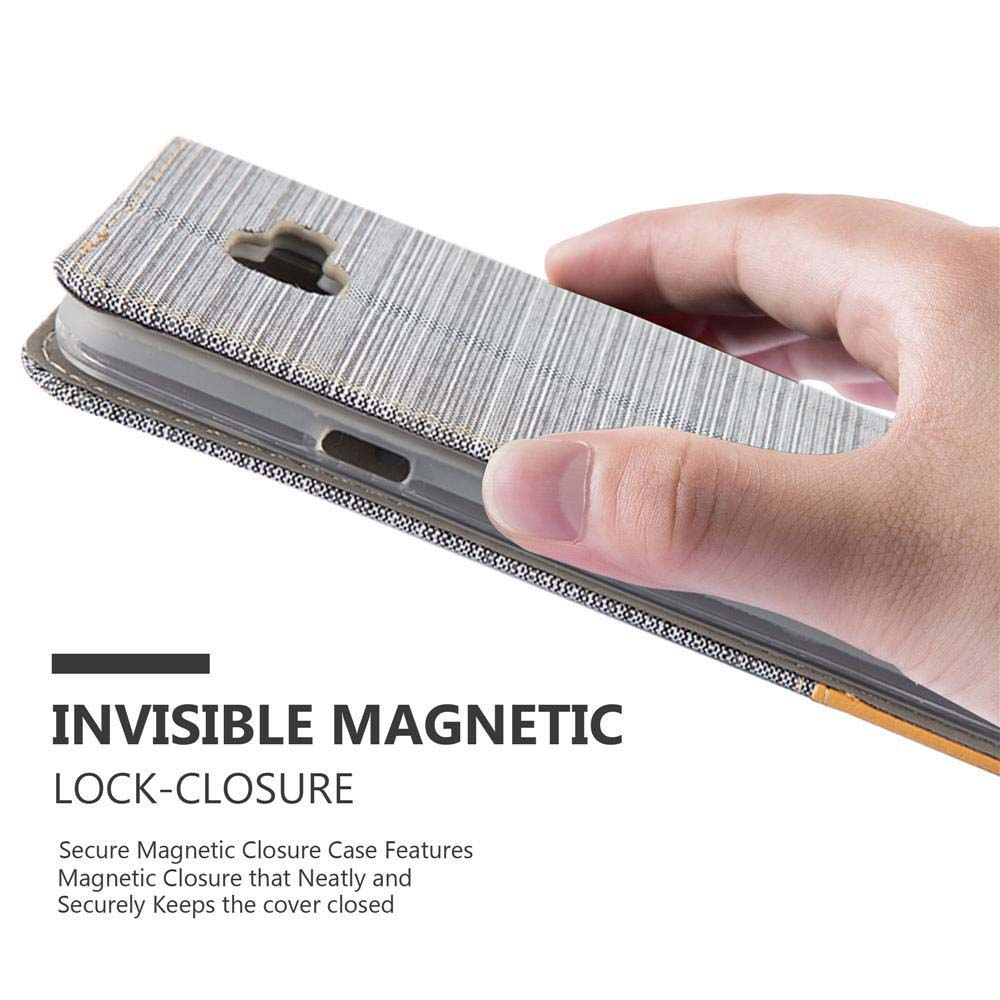 Handy in Hülle, Hand hält, Magnetverschluss.