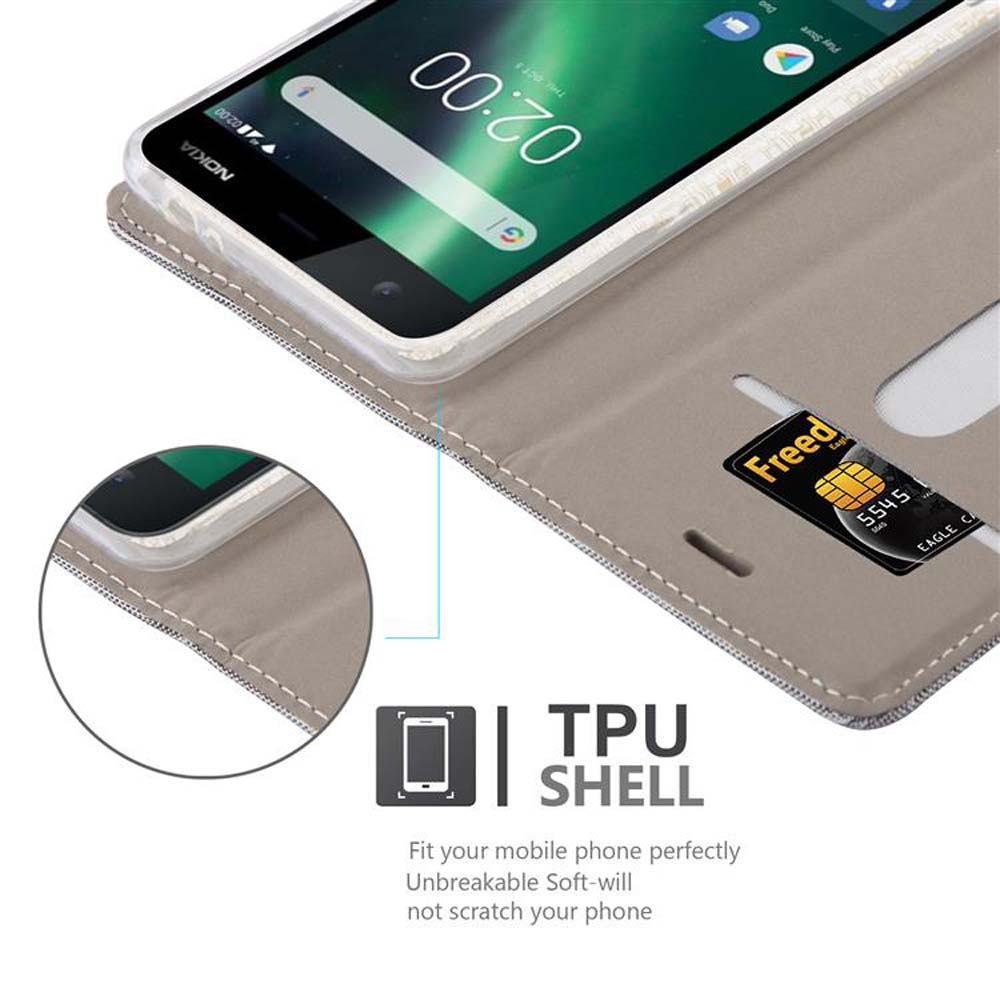 Un telefono con una carta di credito in una custodia a portafoglio. Lo schermo del telefono visualizza le 02:00. La custodia è beige.