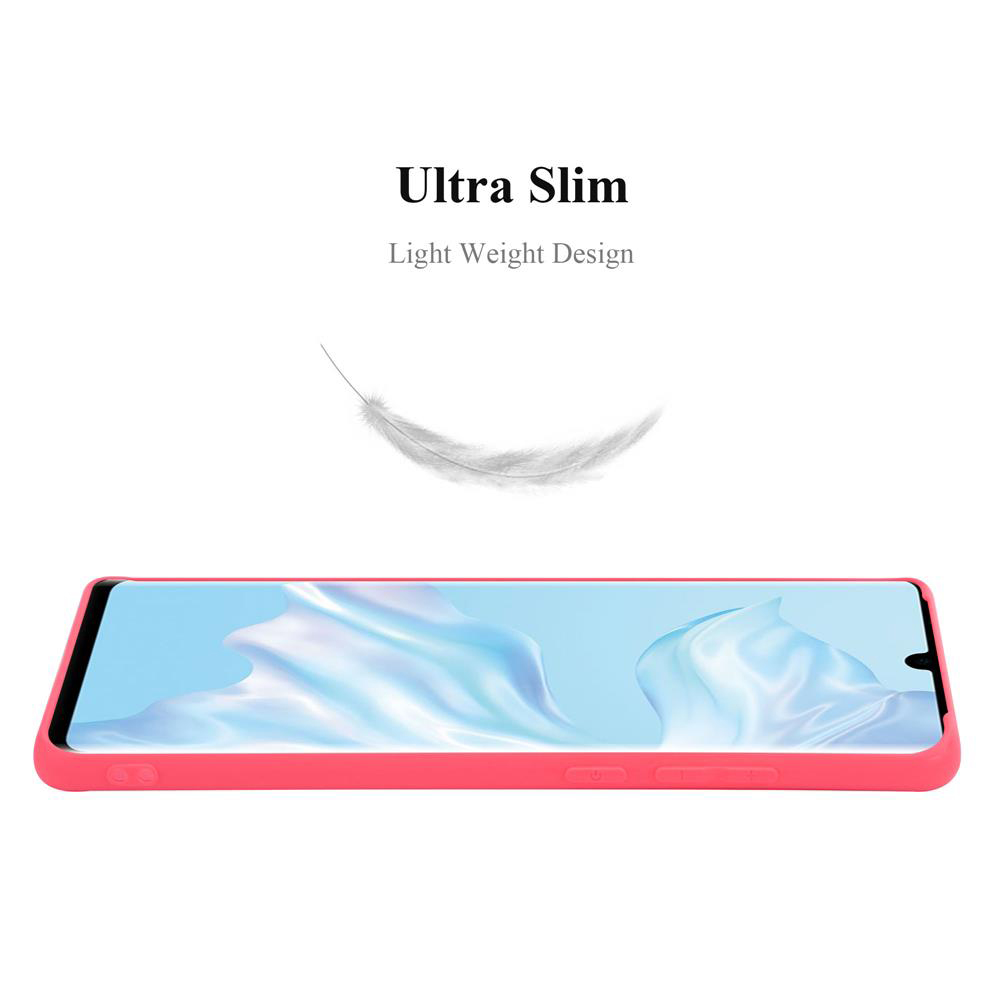 Ein pinkfarbenes Telefon liegt in einer pinkfarbenen Hülle. Eine Feder schwebt über dem Telefon. Text: Ultra Slim.