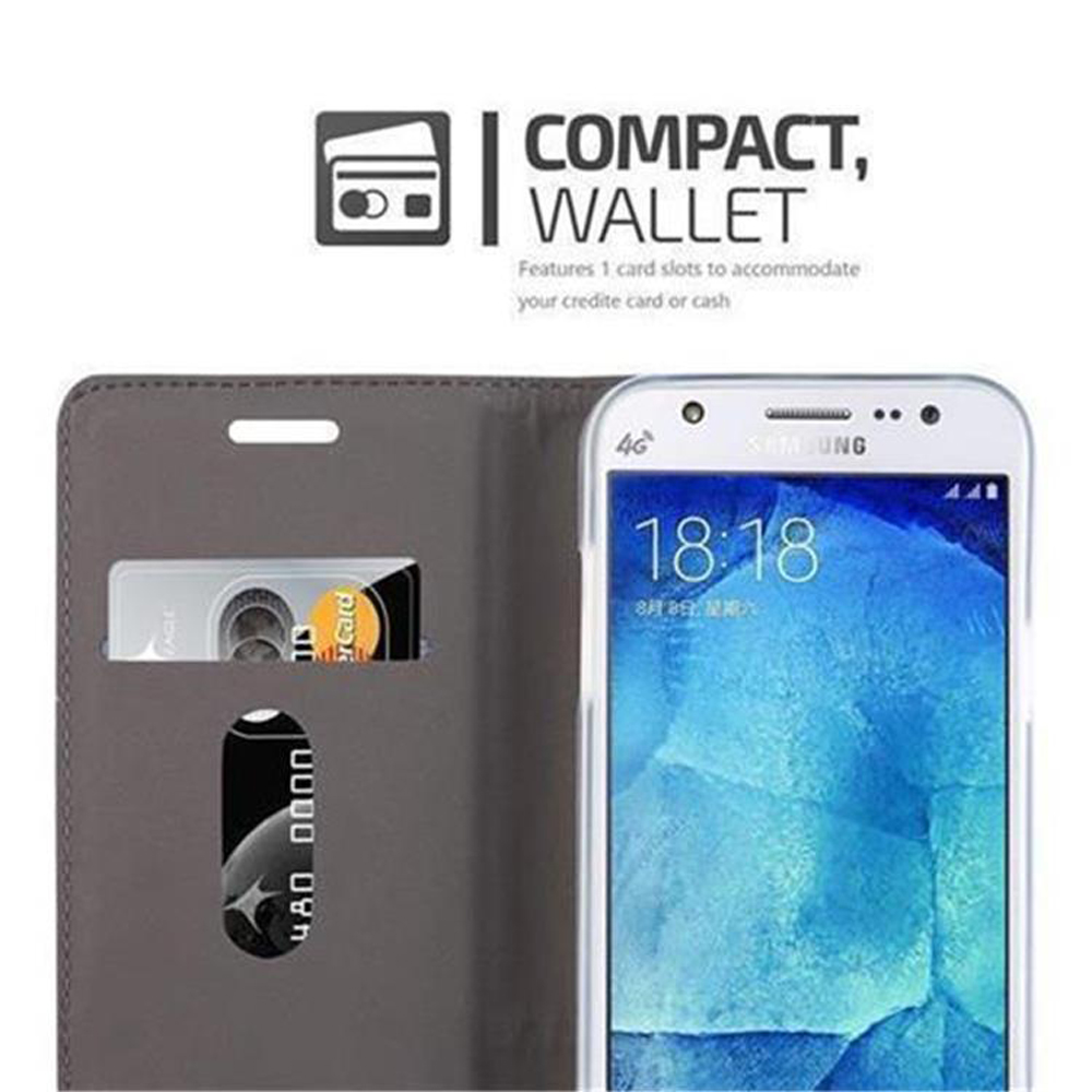 Custodia per smartphone con fessure per carte. Carta di credito e smartphone parzialmente visibili.