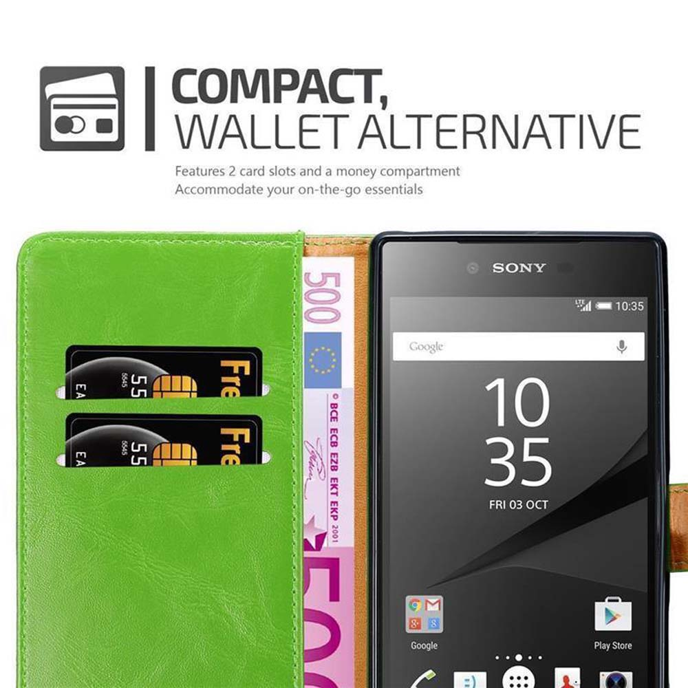 Funda tipo cartera verde con dos tarjetas y dinero. El teléfono muestra la hora. Texto: Compacto, Alternativa de cartera.