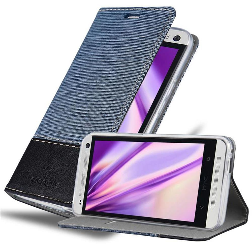 Teléfono en funda abierta. Funda vaquera azul y negra. Pantalla morada.