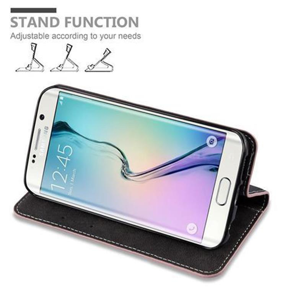 Smartphone steht in einer schwarzen Hülle. Die Hülle ist zu einem Ständer gefaltet. Weißer Hintergrund.