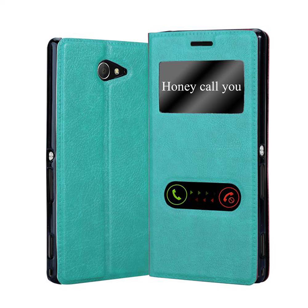 Funda de teléfono turquesa abierta, con pantalla de llamada que dice "Honey call you". Iconos de llamada rojos y verdes.