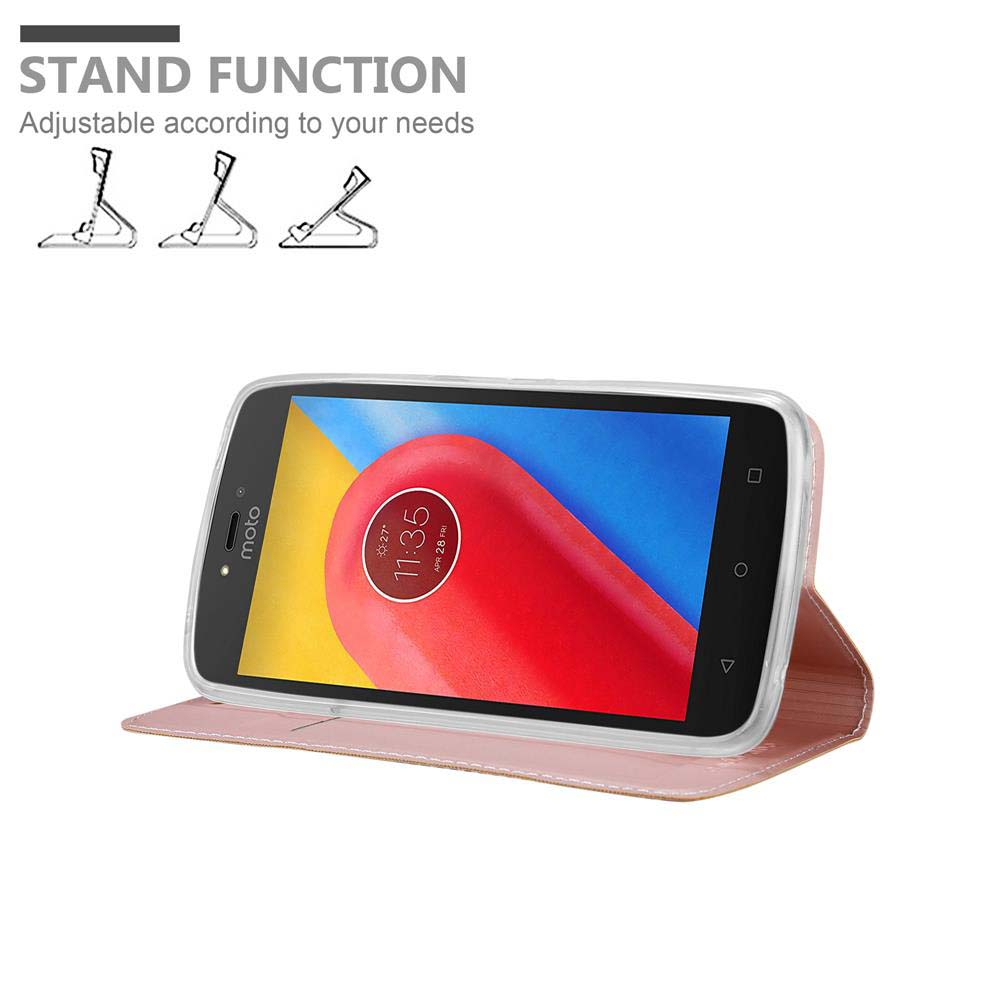 Ein Telefon befindet sich in einer rosa Hülle, die sich zu einem Ständer öffnet. Das Telefon zeigt die Zeit an.