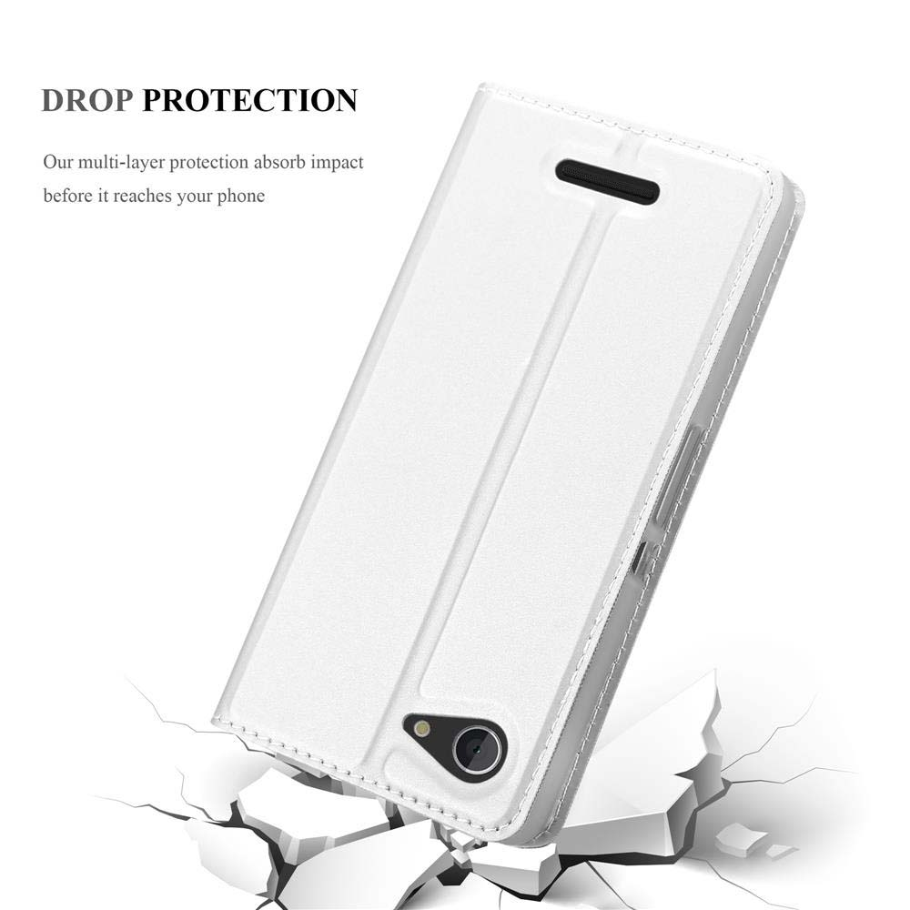 Custodia bianca con telefono, su superficie con detriti. Testo: Drop Protection.