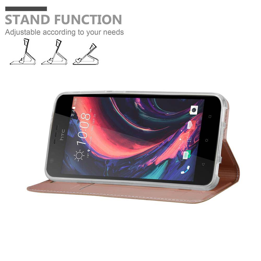 Un telefono in una custodia, appoggiato. Lo schermo mostra le app, con il testo: STAND FUNCTION.
