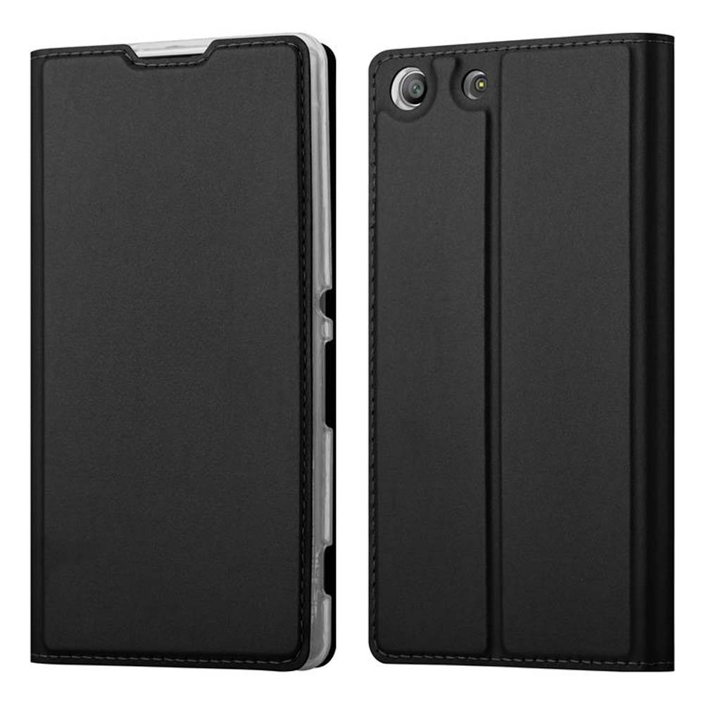 Dos fundas negras para teléfono, cerradas. Son de color negro liso.