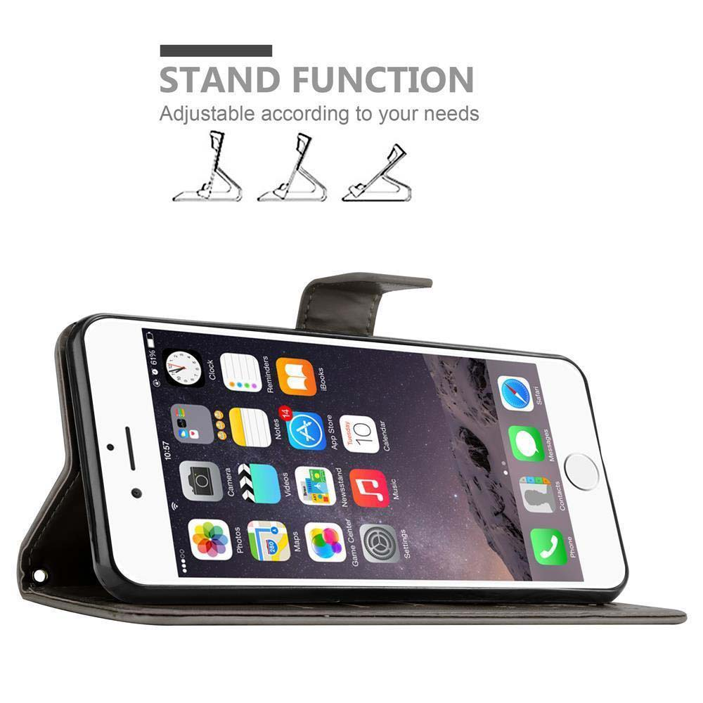 Telefono in custodia a portafoglio. Funzione stand dimostrata con coperchio aperto.