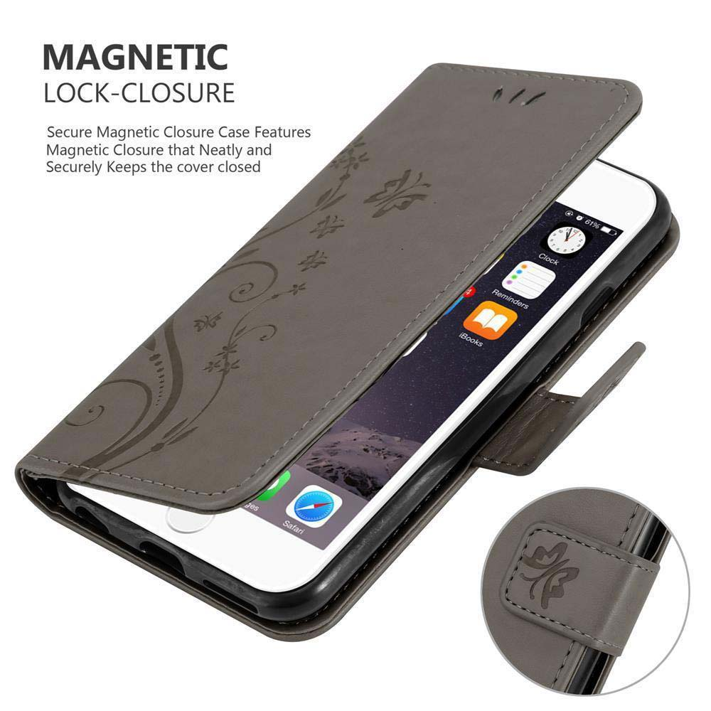 Custodia a portafoglio grigia aperta, che mostra il telefono. Design floreale e chiusura magnetica.