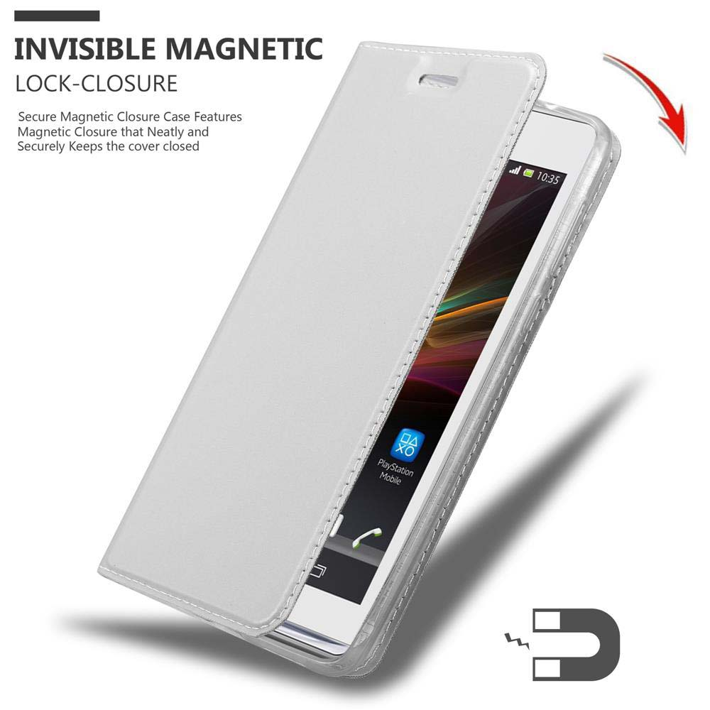 Eine weiße Handyhülle ist geöffnet und gibt ein Telefon frei. Der Text lautet INVISIBLE MAGNETIC LOCK-CLOSURE. Ein Magnet wird gezeigt.