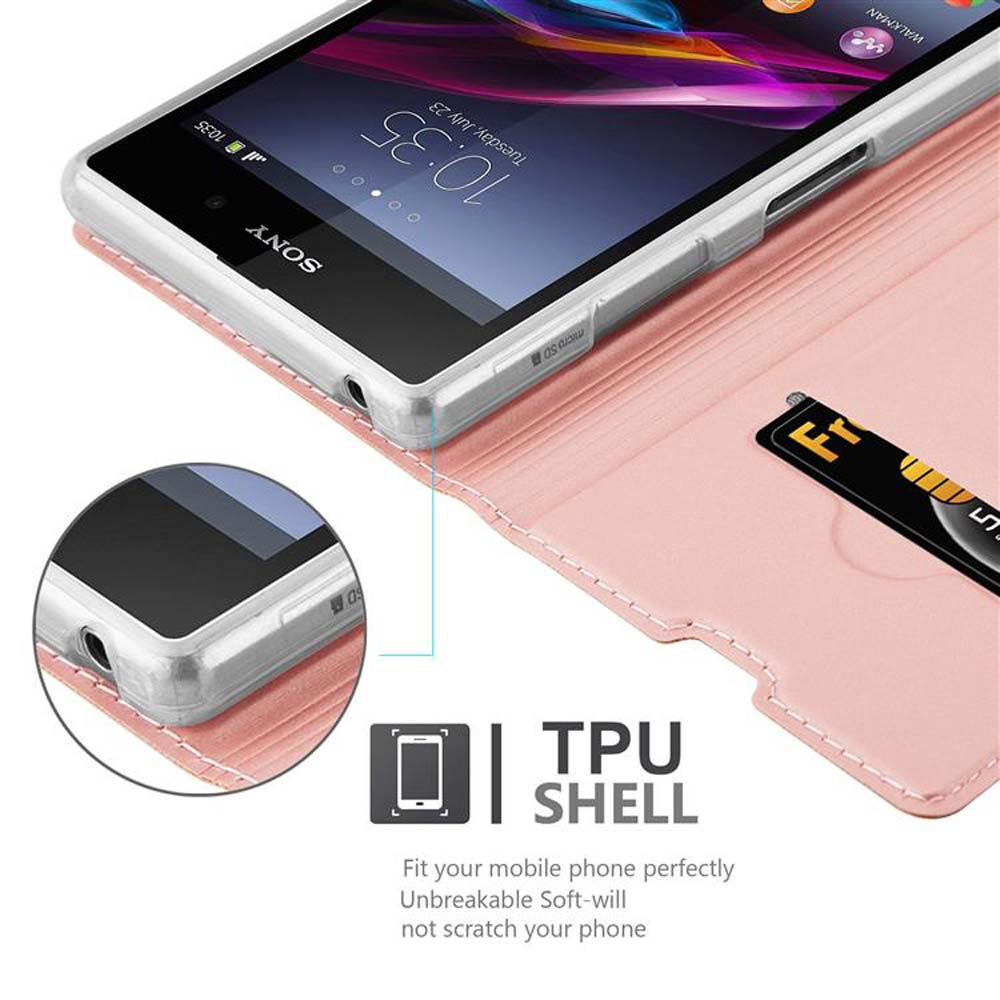 Uno smartphone in una custodia rosa con una carta. Il telefono mostra uno schermo con un'immagine e l'ora.