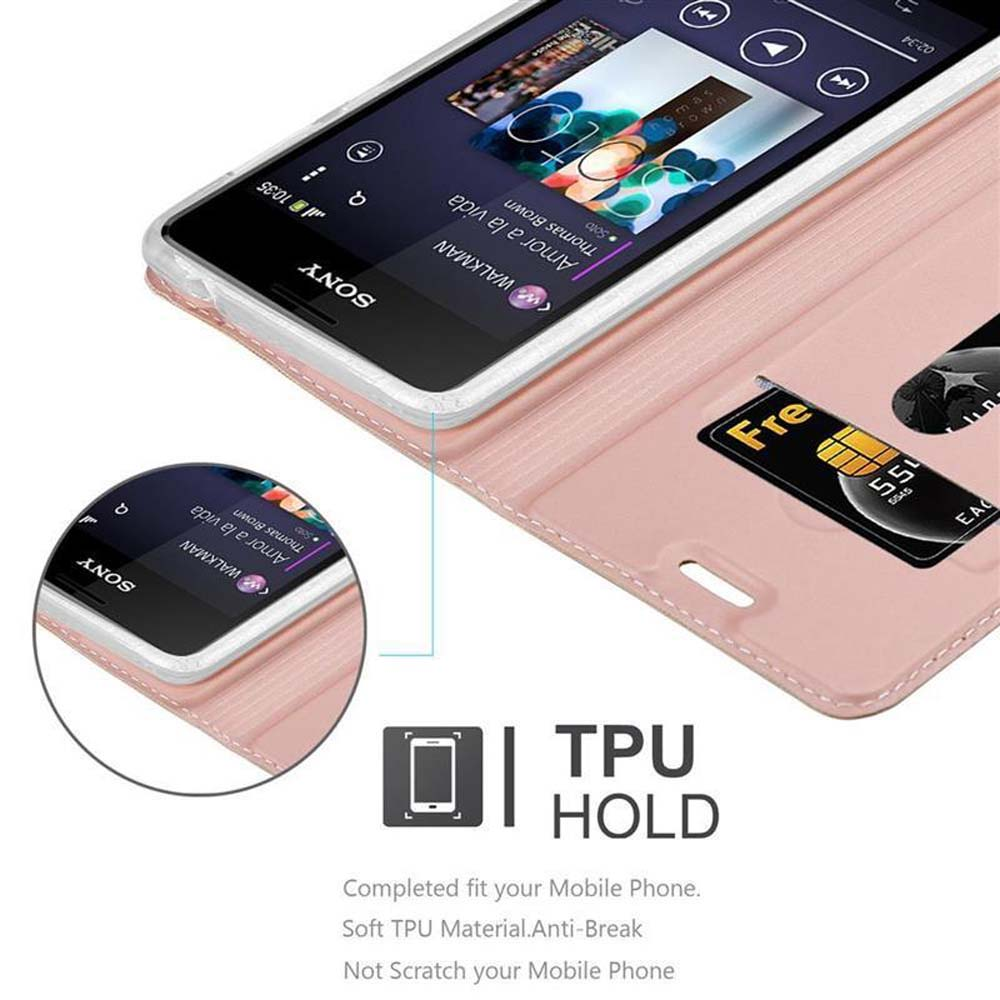Un teléfono en una funda rosa con una tarjeta de crédito. La pantalla muestra una interfaz musical.