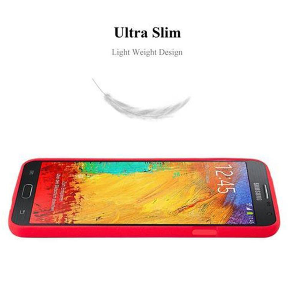 Uno smartphone rosso in una custodia rossa. Una piccola piuma bianca è sopra il telefono.