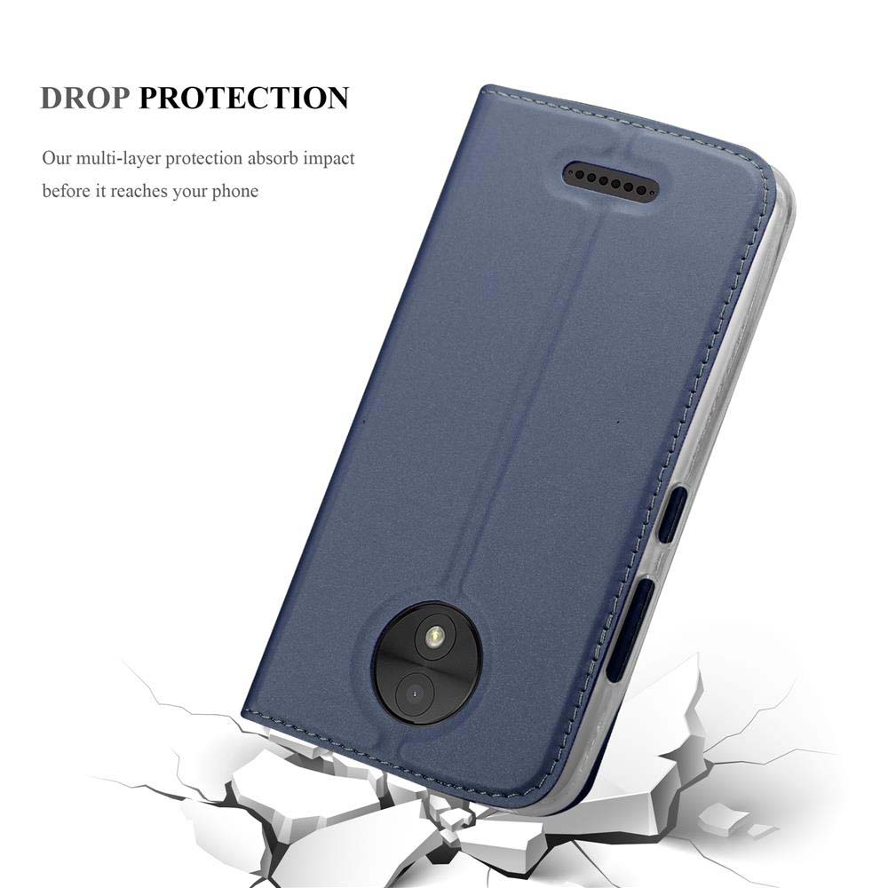 Eine blaue Handyhülle mit einem Telefon darin, mit dem Telefon auf einer Oberfläche.