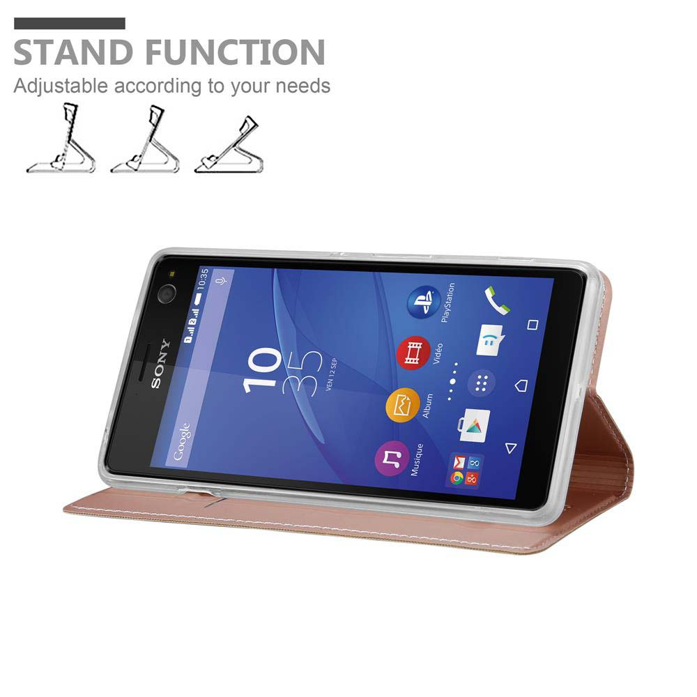 Ein Telefon in einer Hülle, die aufrecht steht. Anzeige zeigt die Uhrzeit. Text: Standfunktion.