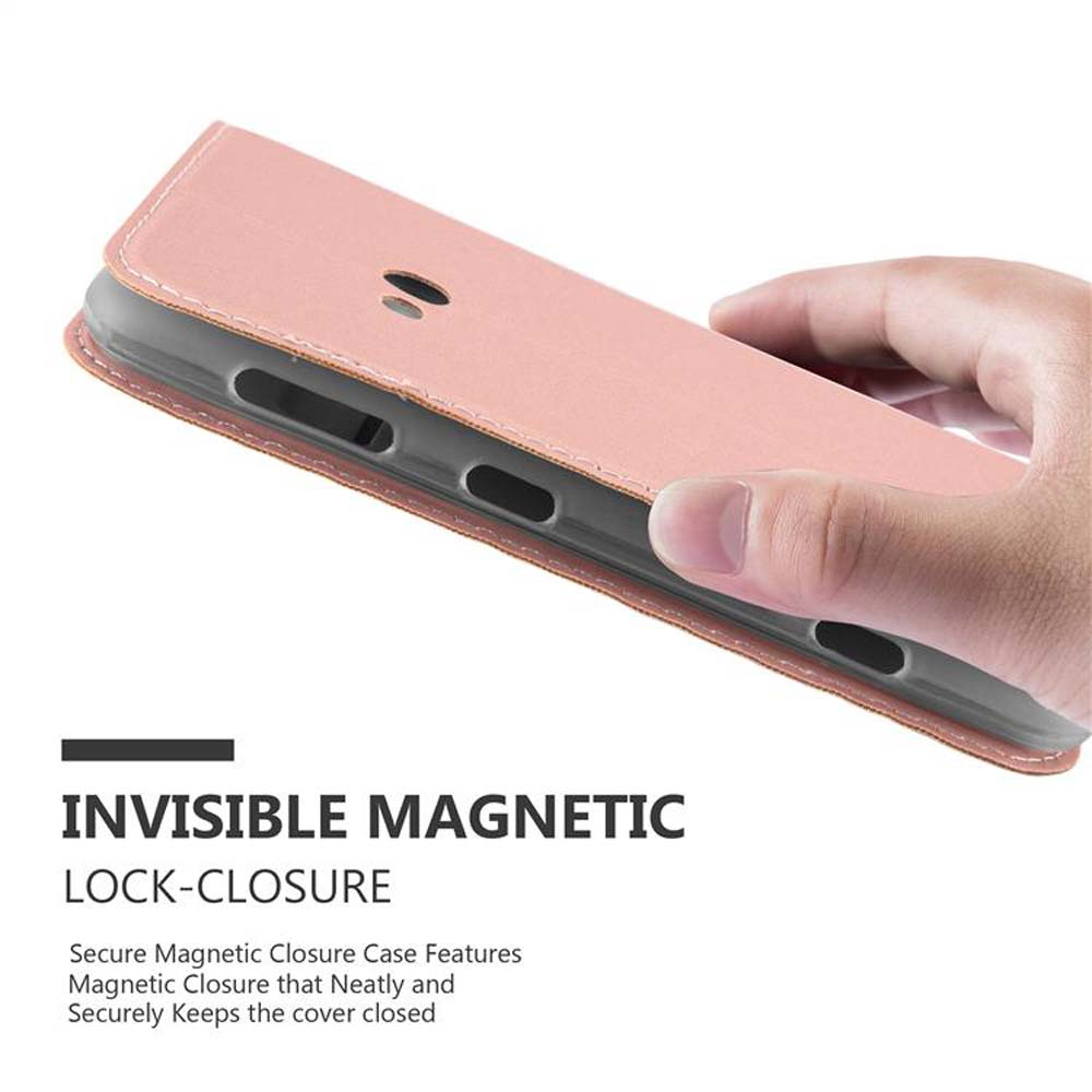 Custodia per telefono rosa, aperta, che mostra il telefono all'interno. La custodia ha una chiusura magnetica. Sfondo bianco.