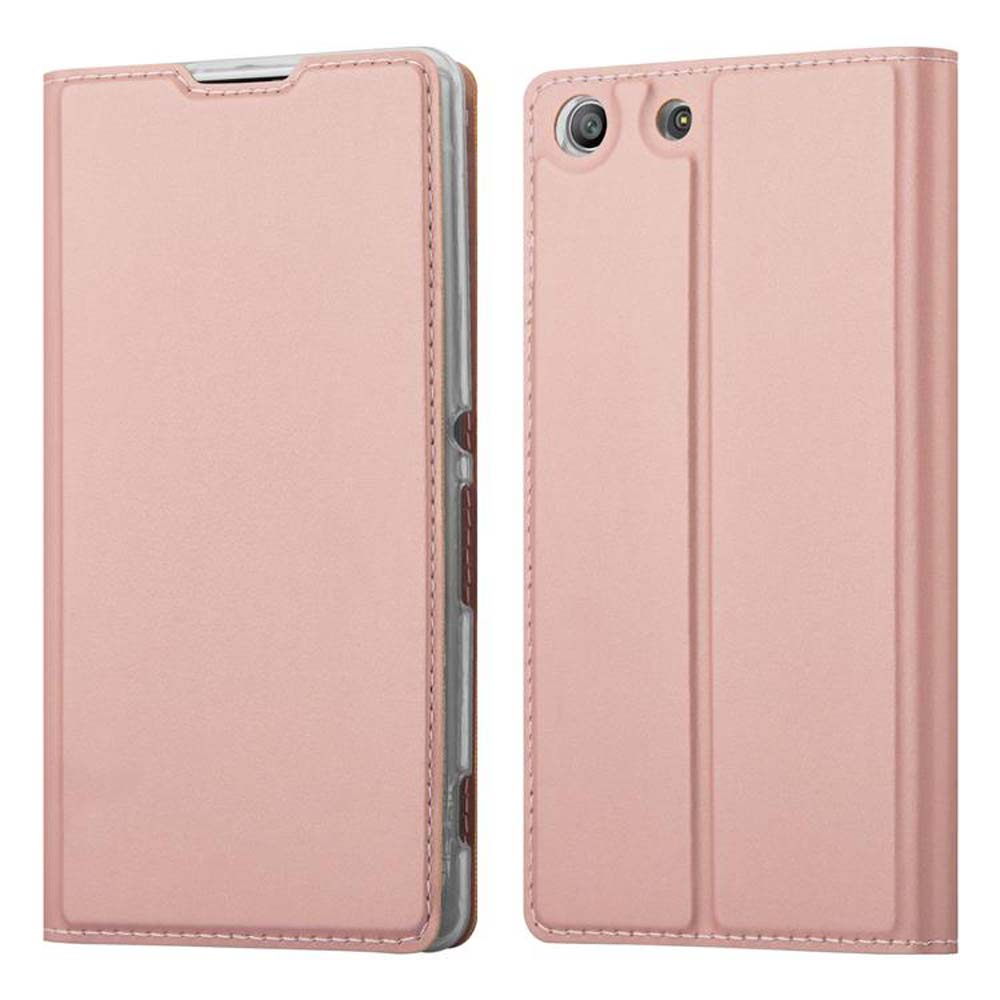 Funda rosa para teléfono, cerrada y abierta. El teléfono no es visible. El fondo es blanco.