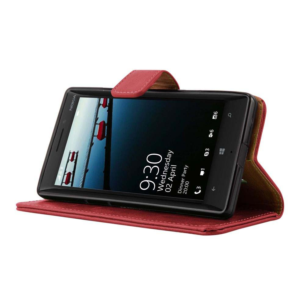 Teléfono negro con funda roja, mostrando la hora. La funda está abierta sobre una superficie.