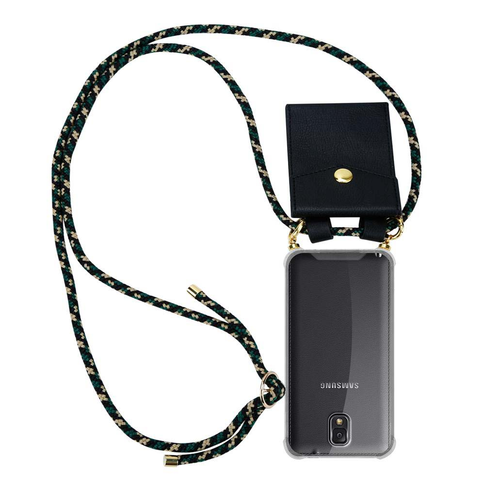 Telefono con cordino, custodia e cinturino neri. Custodia nera con bottone dorato. Corda verde e bianca.