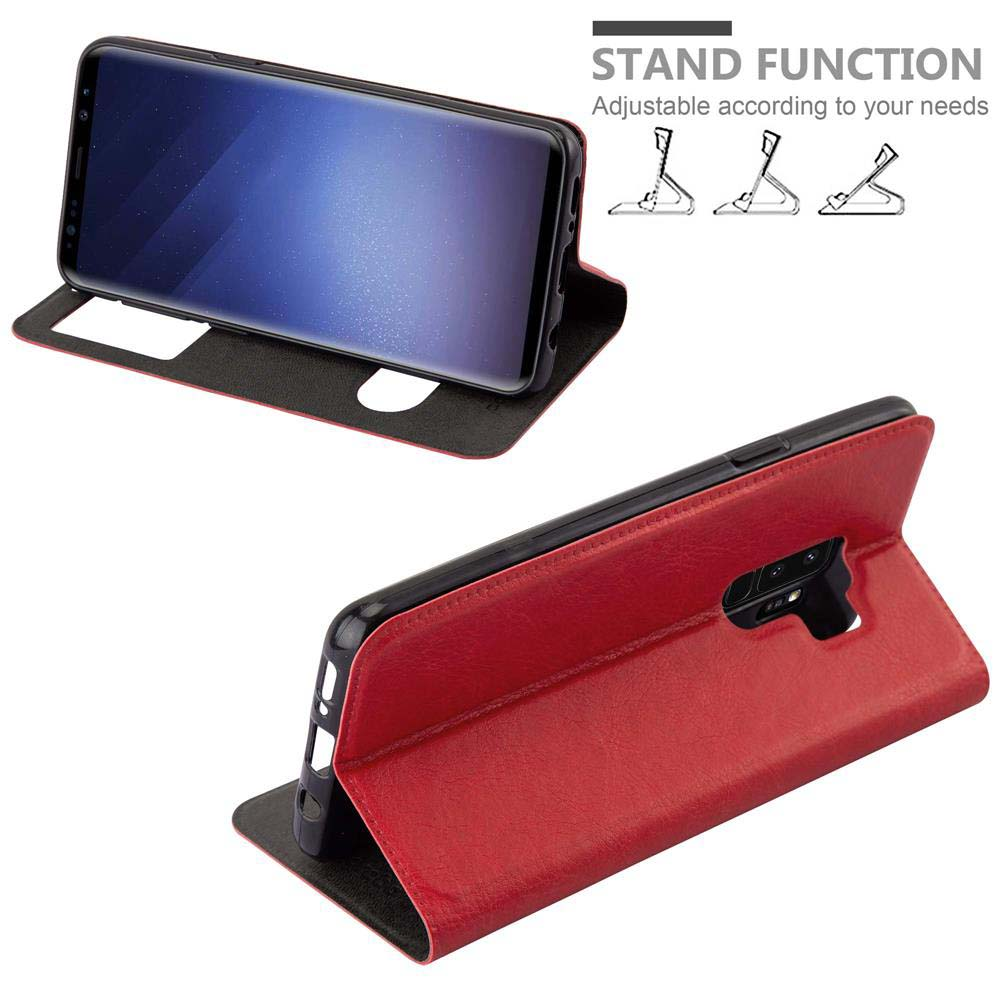 Un telefono in una custodia rossa è su un supporto. Testo: Funzione stand, regolabile.