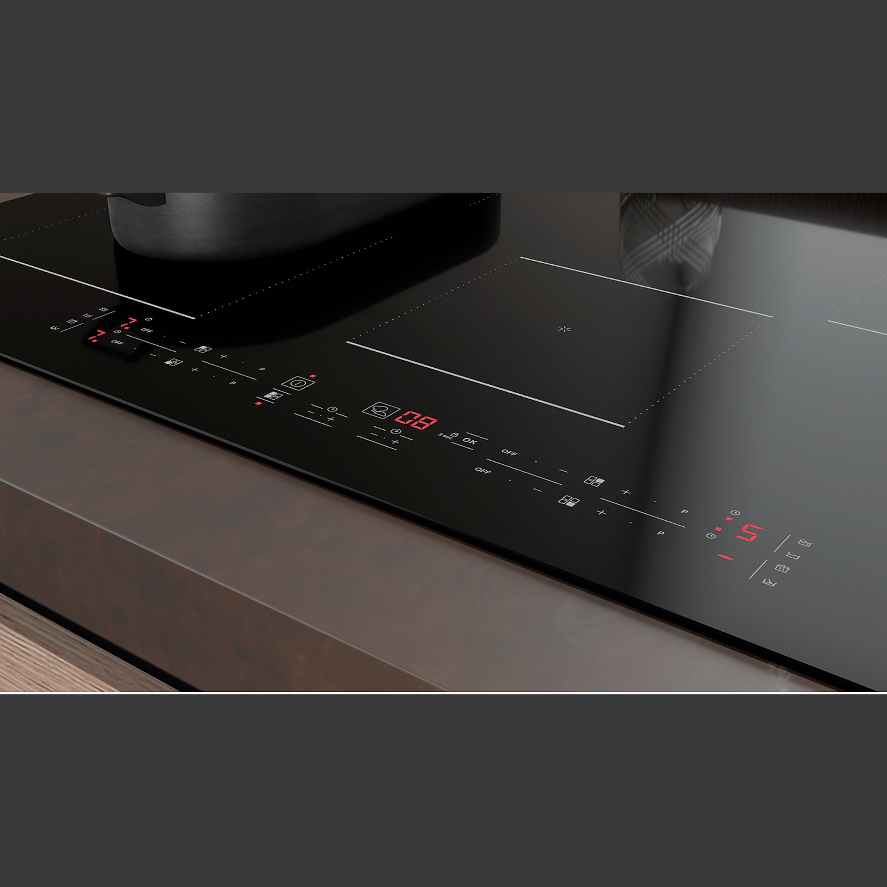 Czarna szklana płyta grzewcza z czerwonym wyświetlaczem cyfrowym. Garnek po lewej stronie. Widoczne przyciski i linie.