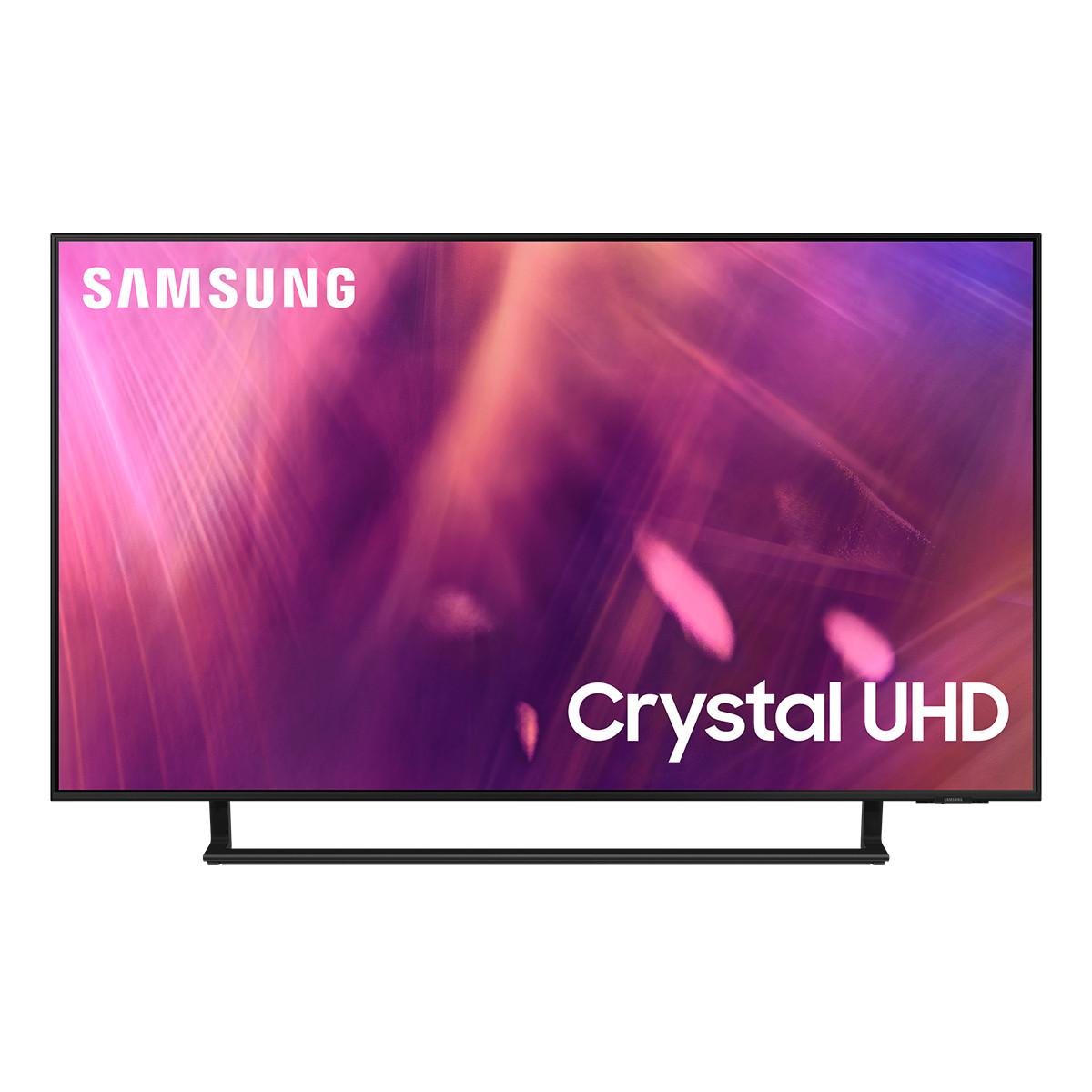 TV Samsung Crystal UHD. Lo schermo mostra un gradiente viola e rosa. Cornice e supporto neri.
