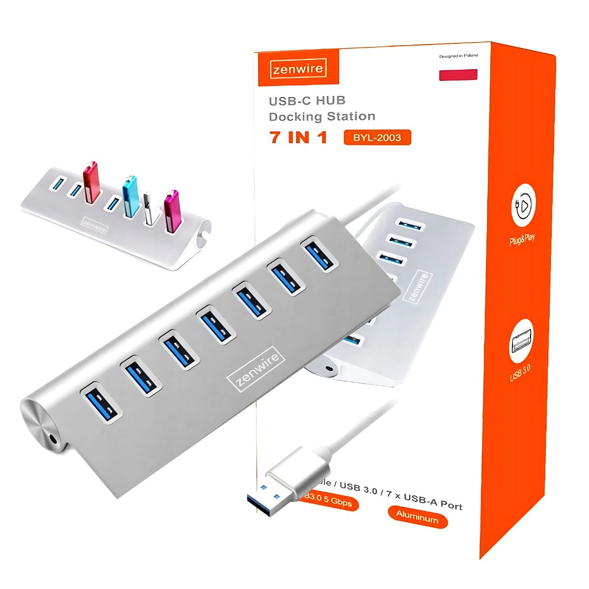 Srebrny hub USB-C i pudełko z hubem. Posiada wiele portów USB.