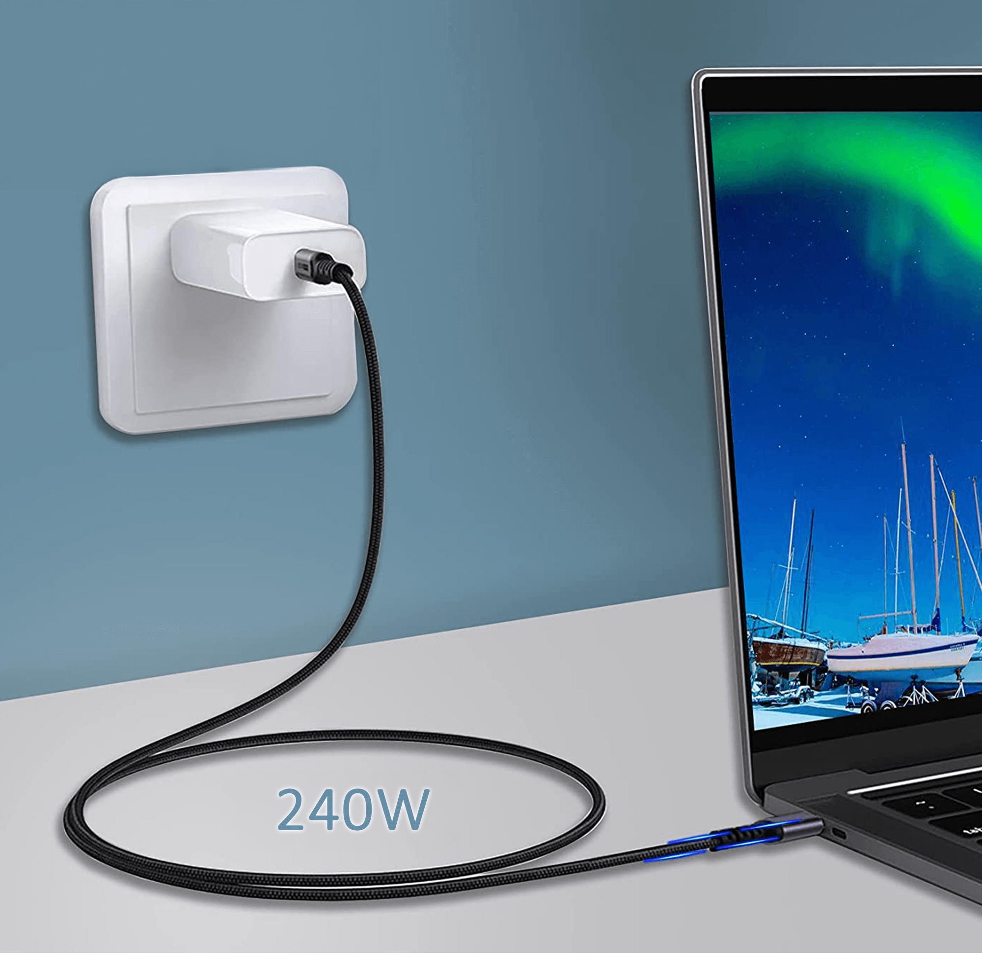 Czarny kabel ładujący podłączony do laptopa i gniazdka. Kabel mówi 240W.