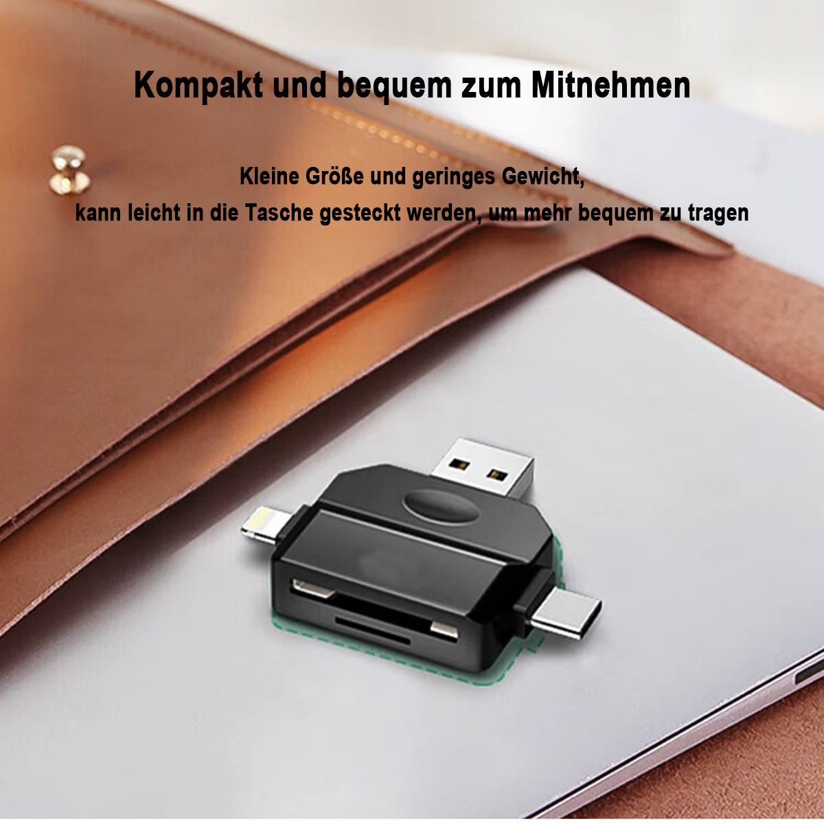 Ein schwarzer USB-Adapter, der mit einem Laptop und einem Telefon verbunden ist.