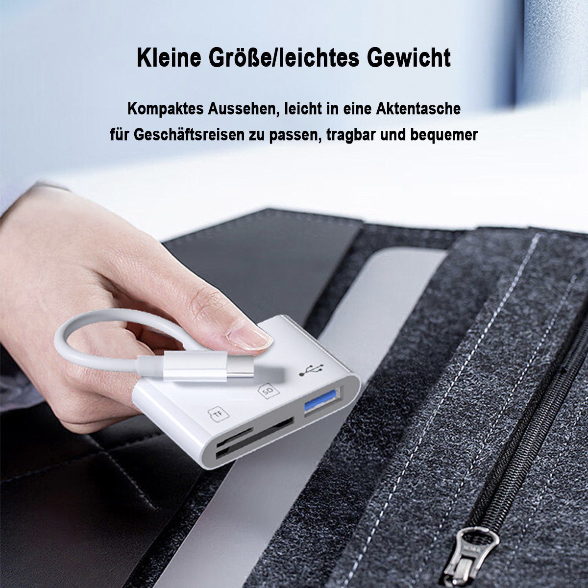 Ein weißer Adapter mit weißem Kabel, verbunden mit einem dunkelgrauen Gehäuse.
