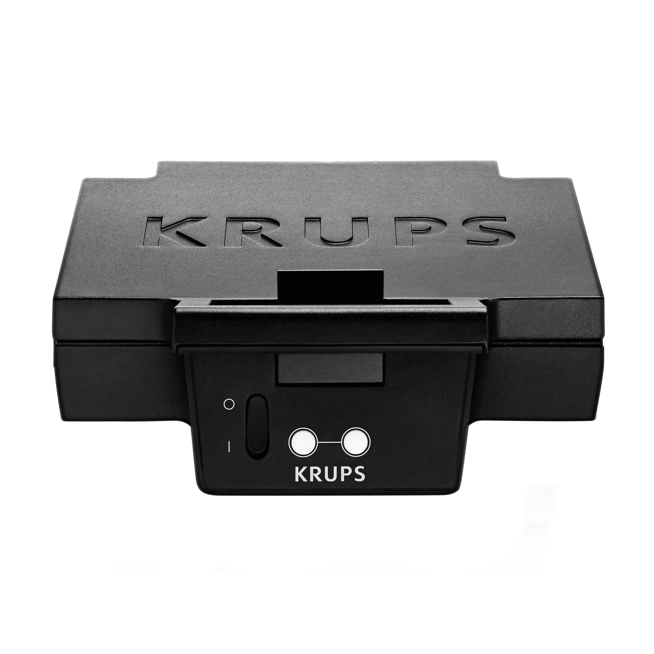 Czarne urządzenie KRUPS z przyciskami i logo KRUPS. Ma gniazdo, prawdopodobnie na kapsułkę.