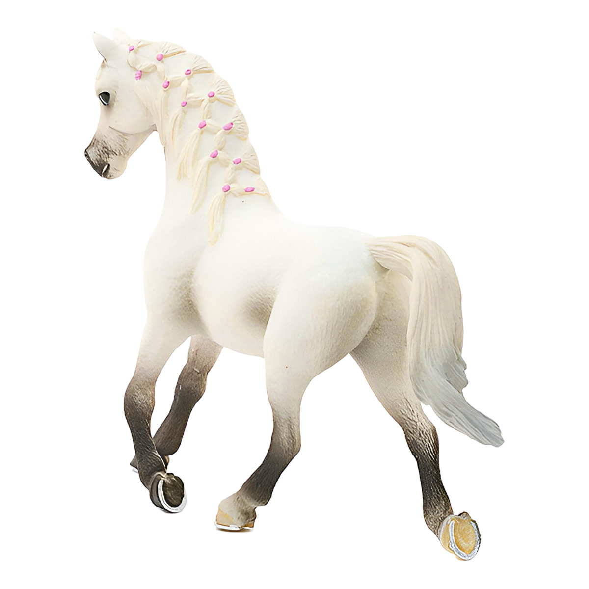 Cavallo giocattolo bianco con dettagli di criniera e coda intrecciate rosa, su sfondo bianco.