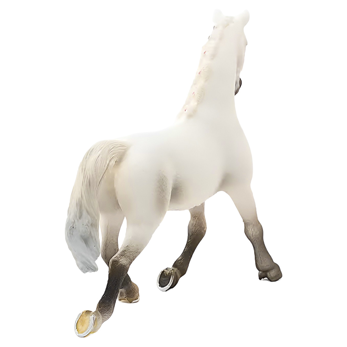 Cavallo bianco giocattolo che corre, visto da dietro, con zampe e criniera dettagliate.