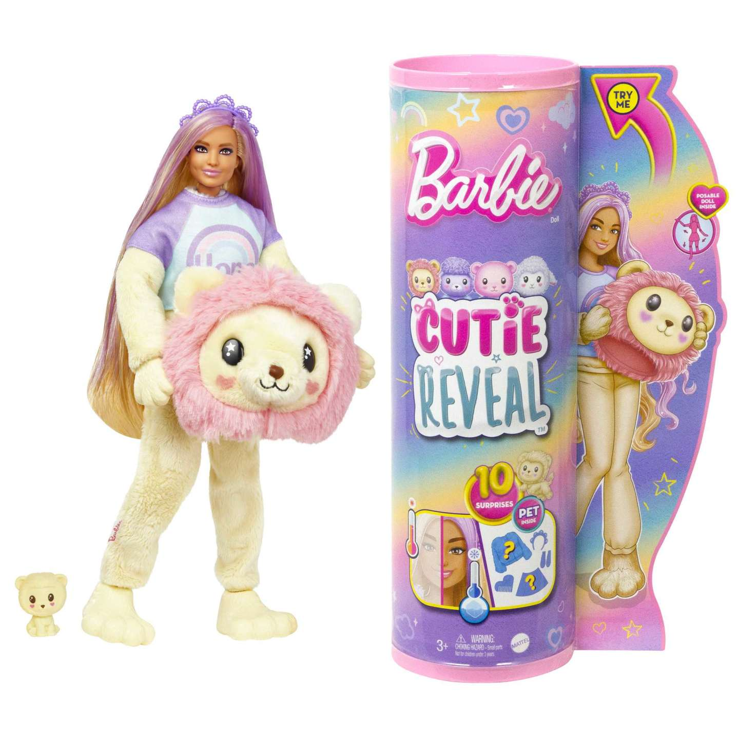 Lalka Barbie w kostiumie lwa z akcesoriami, tuba z logo Barbie i mała figurka misia są widoczne.