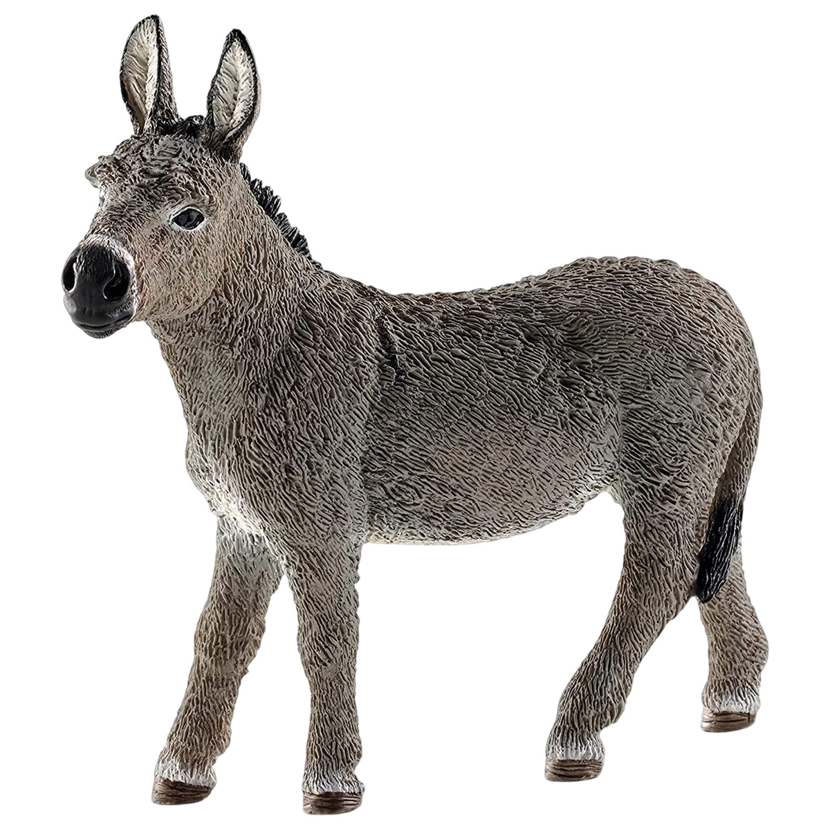 Una statuina di asino su una superficie bianca. È grigio e marrone. Lo sfondo è bianco.