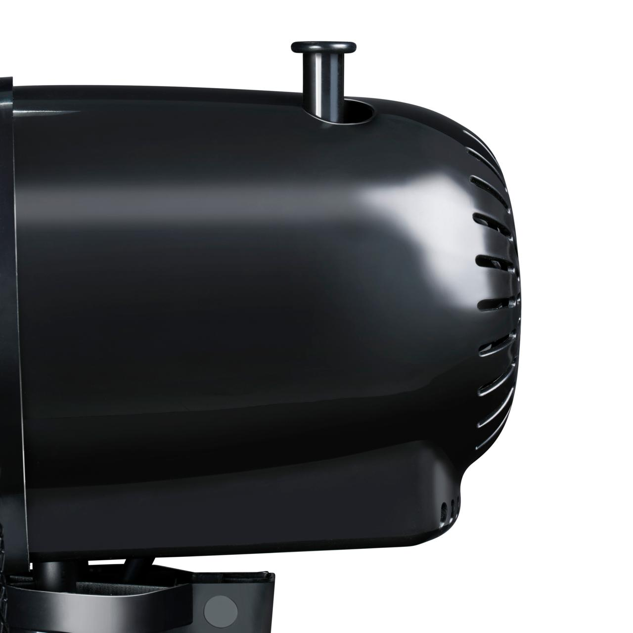 Appareil noir avec le haut arrondi et une petite pièce cylindrique verticale sur le dessus.
