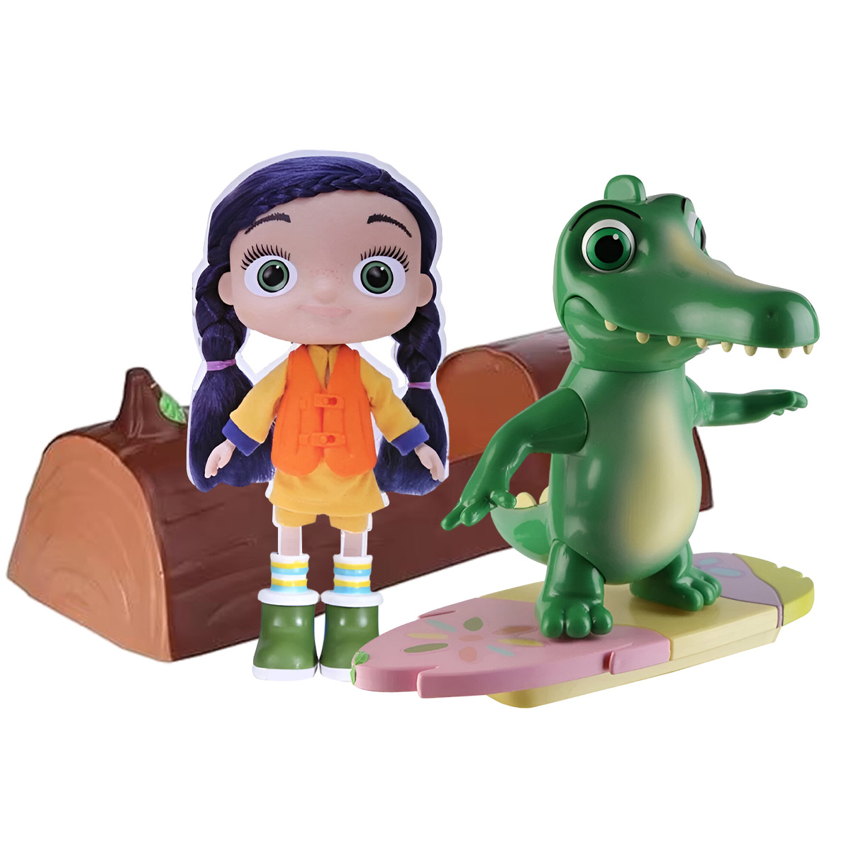 Puppe mit Zöpfen, orangefarbener Weste und ein grüner Alligator auf einem Surfbrett bei einem braunen Baumstamm.