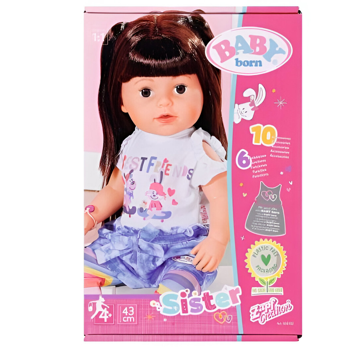 Eine Puppe in einer Box, trägt ein weißes Hemd und blaue Shorts, mit pinkfarbenem Hintergrund.